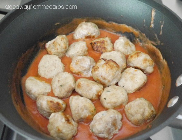 Low Carb Turkey Meatballs with Ricotta and Thyme, served in a tomato cream sauce. Keto and glutem free recipe. 