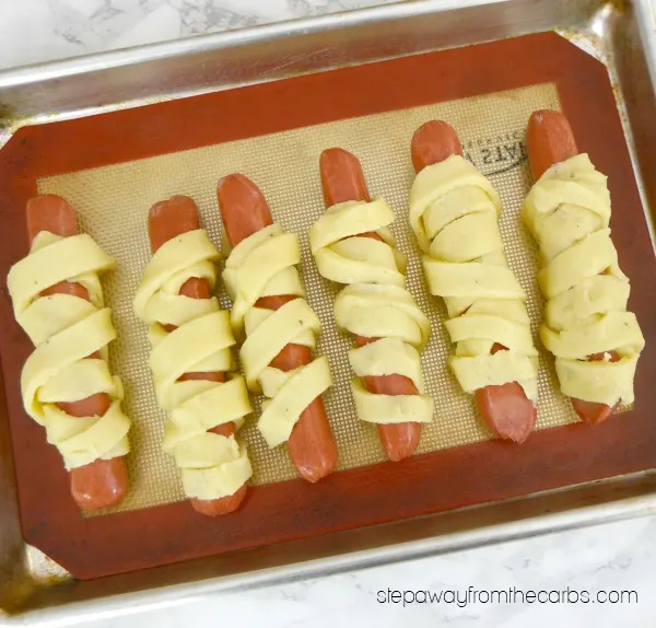 Low Carb Mummy Dogs - a keto, gluten free, and LCHF recipe that is perfect for Halloween!