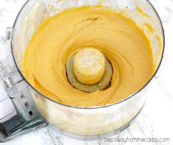 mixing the pumpkin fat bomb ingredients in a food processor