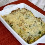Baked low carb turkey casserole with golden melted cheese in a white baking dish