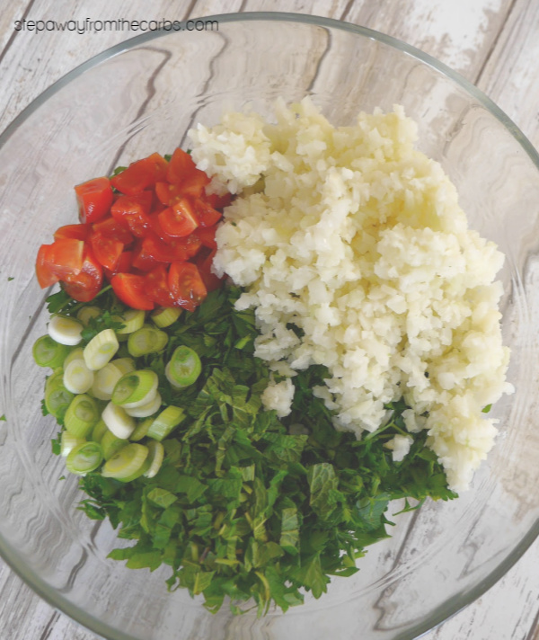 Low Carb Tabbouleh with Cauliflower Rice - a light and fresh herby side dish. Keto and gluten free recipe.