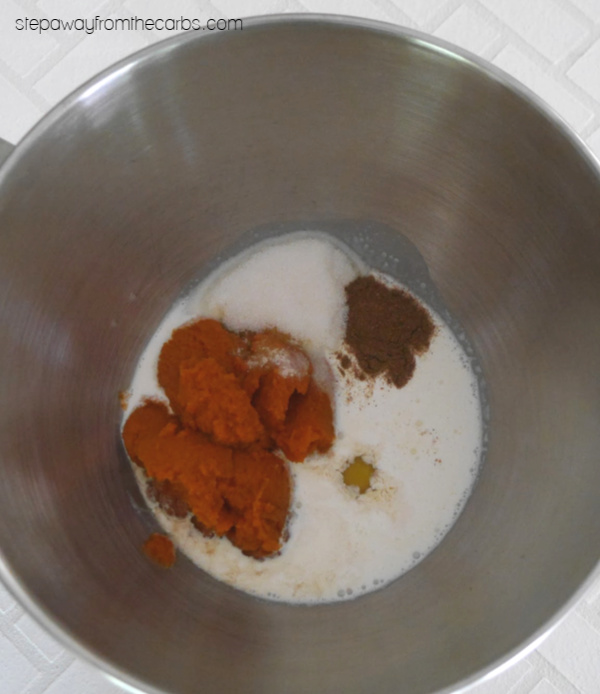 mixing the batter for keto pumpkin muffins