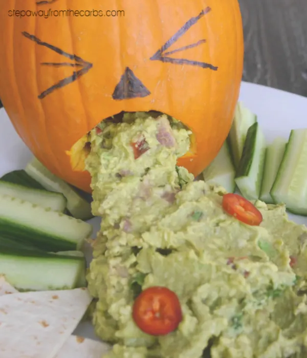 Puking Pumpkin with spicy guacamole and low carb chips. Perfect for Halloween!