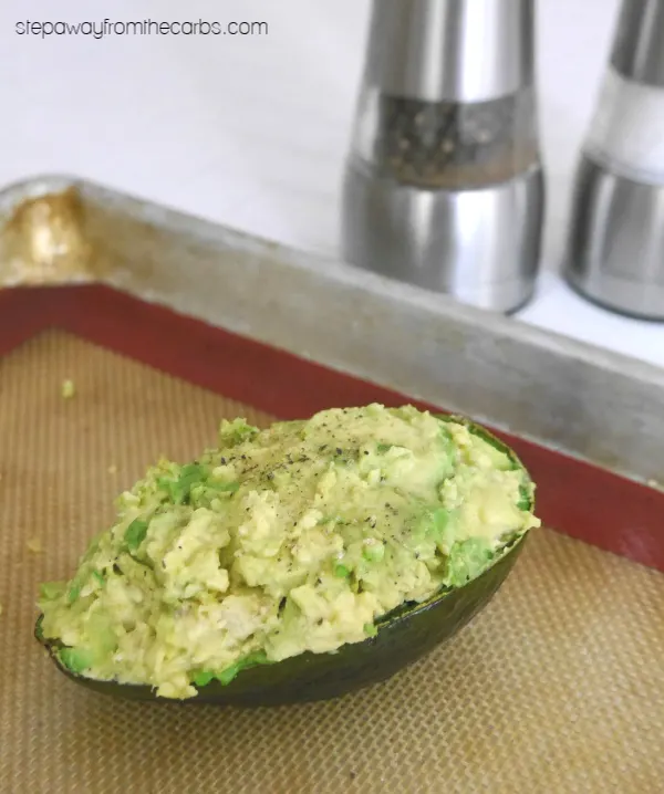 Loaded Baked Avocado - a low carb alternative to baked potato! An easy lunch recipe.