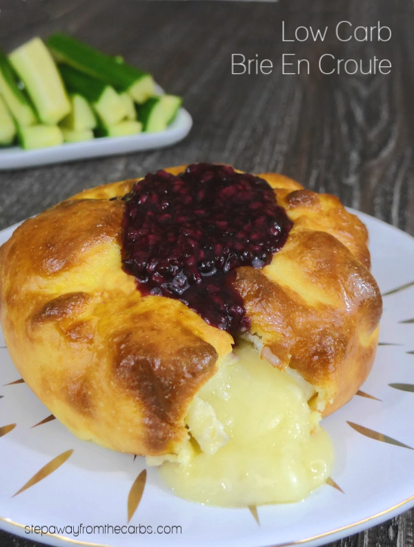 Low Carb Brie En Croute - an indulgent appetizer! Brie wrapped in Fathead dough and served with a blackberry sauce. 