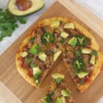 Low Carb Mexican Pizza - made with Fathead dough, salsa, keto carnitas, cheese, and more!