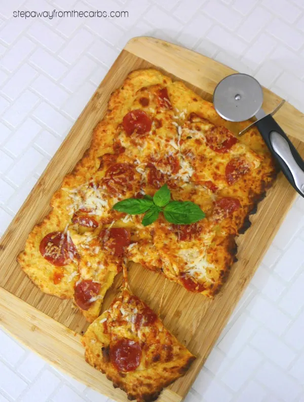 Low Carb Pizza Crust with Pork Rinds - a keto and LCHF recipe ready to be loaded with your favorite toppings!