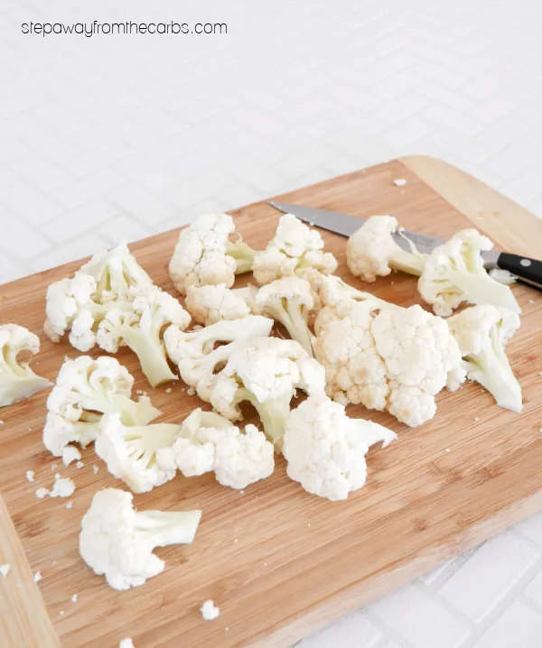Keto Garlic Cauliflower Bites - with Parmesan and pork rind coating. Gluten free appetizer recipe!