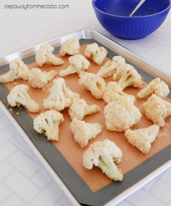 Keto Garlic Cauliflower Bites - with Parmesan and pork rind coating. Gluten free appetizer recipe!