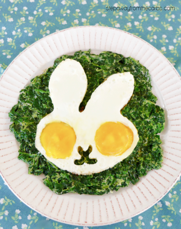 Keto Easter Breakfast - rabbit-shaped fried eggs served on a bed of gorgeous creamed spinach