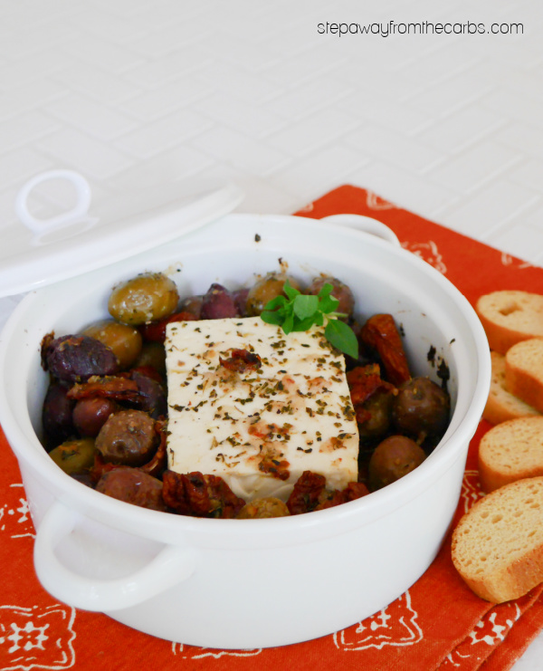 Mediterranean Baked Feta - a low carb appetizer with olives, tomatoes, garlic, and oregano