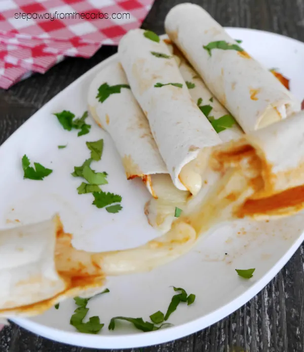 Keto Pizza Roll-Ups - less than 1g net carb each! With pepperoni, sugar free pizza sauce, tortillas, and cheese!