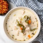 Bowl of creamy keto turkey soup with green beans, carrots and cauliflower rice