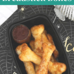 Fathead breadstick bones Pinterest pin showing the bones in a tray with dipping sauce