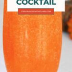 Glitter Halloween Cocktail Pinterest graphic with a close-up of the shimmering orange drink