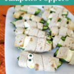 Halloween Jalapeño Poppers wrapped like mummies in low carb tortilla strips