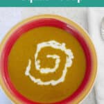Indian Butternut Squash Soup Pinterest pin showing a bowl of the soup with a sour cream swirl