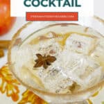 Low Carb Caramel Apple Cocktail Pinterest pin with a sparkling cocktail in a cinnamon-rimmed glass