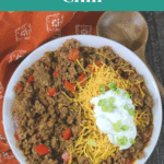 Low Carb Chili pin showing a bowl of ground beef and pork chili with red peppers