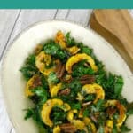 Delicata Squash with Kale and Pecans in an oval serving bowl