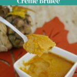 Pinterest graphic for low carb pumpkin pie creme brulee with a spoonful lifted from the ramekin