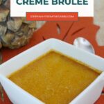 Pinterest graphic for low carb pumpkin pie creme brulee on an autumn leaf placemat