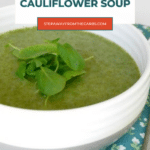 Low Carb Watercress Cauliflower Soup Pinterest graphic showing a bowl of green soup topped with watercress