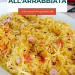 Spaghetti squash all'arrabbiata Pinterest graphic with a bowl of spicy squash and pancetta