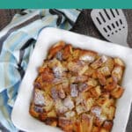 Keto French Toast Casserole Pinterest pin with the baked casserole in a white dish