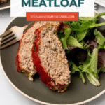 Two slices of keto turkey meatloaf with salad greens - Pinterest pin