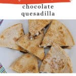 Low carb chocolate quesadilla Pinterest pin with crispy tortilla wedges on a plate