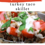 Low Carb Turkey Taco Skillet - a spoonful of ground turkey with melted cheese and red bell pepper