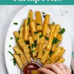 Low Carb Turnip Fries Pinterest graphic showing a turnip fry being dipped in ketchup