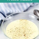 Low Carb White Sauce recipe pin with a bowl of creamy keto bechamel