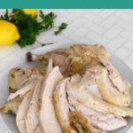 Whole Poached Chicken in the Instant Pot Pinterest image with sliced chicken on a plate